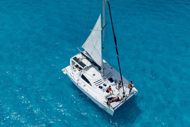 Isla Mujeres Day Tour with Catamaran, Snorkeling & Beach Club - Bahia Mujeres snorkeling, beautiful but not gentle