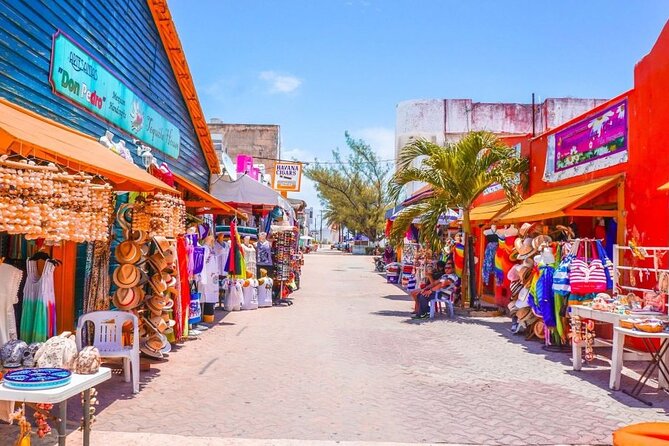 Isla Mujeres Tour with Open Bar Food and Snorkeling - Snorkeling near statues and reef