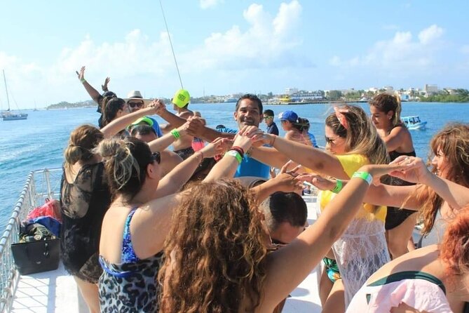 Isla Mujeres Tour with Open Bar Food and Snorkeling - Sunset, music, and contests on the way back