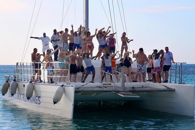 Jamaica Dunn's River Falls Party Cruise with Snorkeling - Sailing to the snorkeling stop