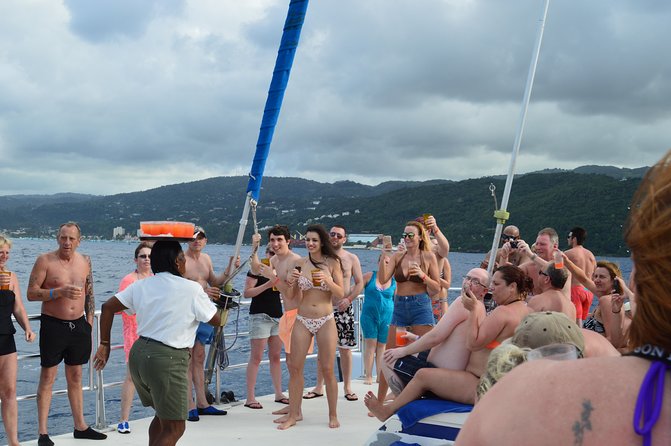 Jamaica Dunn's River Falls Party Cruise with Snorkeling - Food, drinks, and the catamaran party