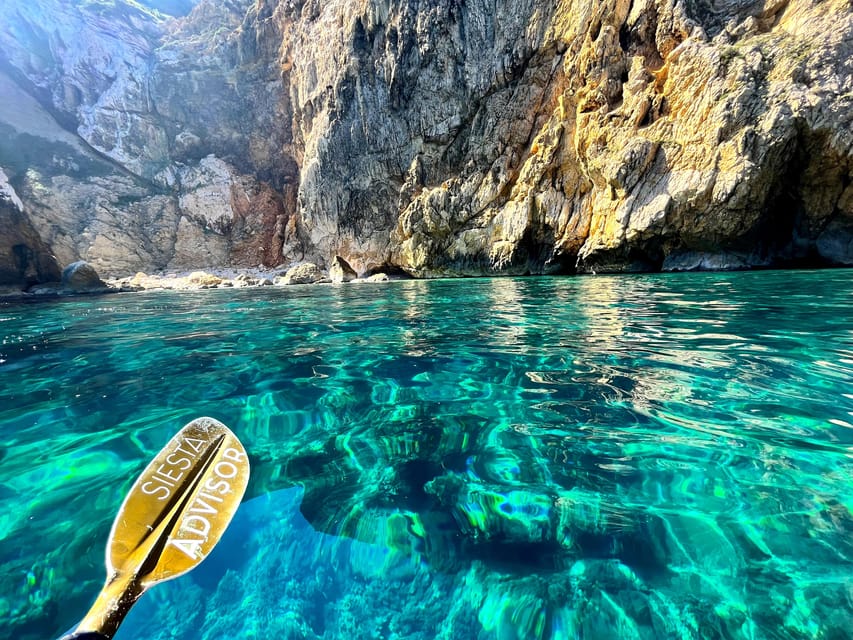 Jávea: Cala Portixol Kayak Tour with Snorkel & Cliff Jumping - Passing below Cap Negre