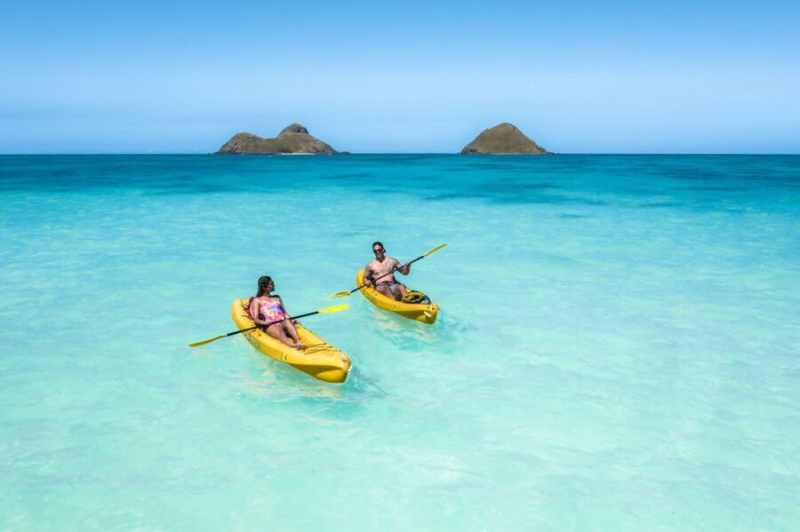 Kailua: Mokulua Islands Guided Kayak and Snorkeling Tour - Kayak surfing on the way back