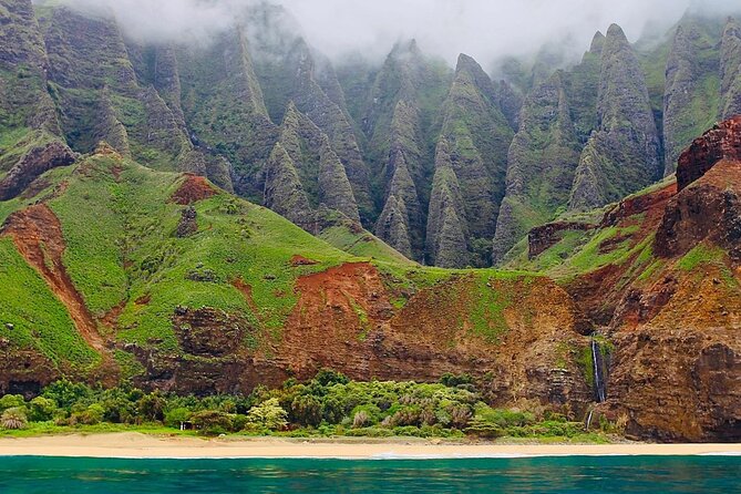 Kauai: Nā Pali Coast Zodiac Raft Expedition and Snorkeling - Snorkeling in a sheltered bay, when conditions allow