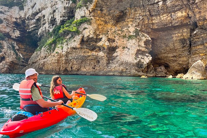 Kayak Paradise: Cala Portixol Snorkel, Cave & Cliff Jumping Tour - Cala el Pom, a quiet first water stop