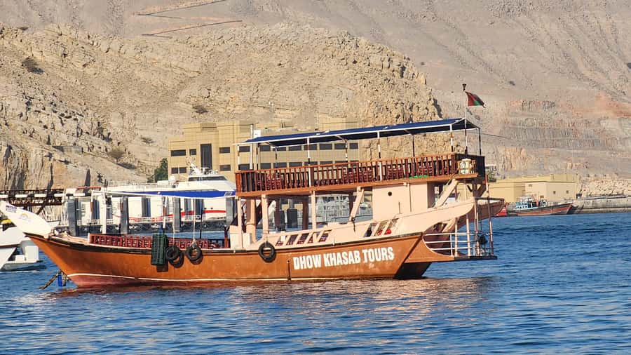 Khasab: Half-Day Dhow Cruise, Dolphin Watching, & Snorkeling - A dhow ride through Musandam’s steep fjords