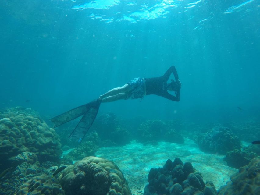 Ko Lipe: Outside Zone Snorkeling Trip by Longtail Boat - Riding a local longtail boat
