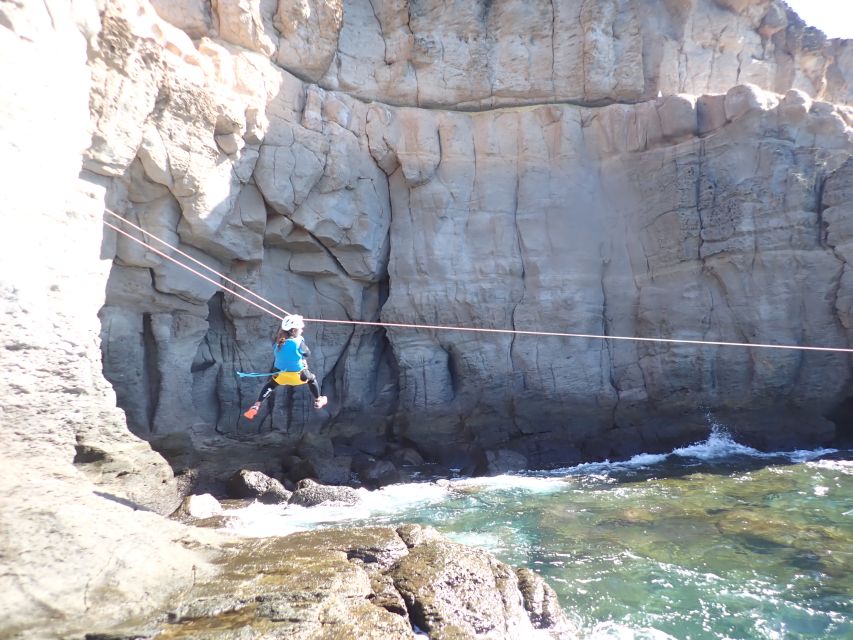 Las Palmas: Coastering, Via Ferrata, Water Jumping & Snorkel - The suspension bridge, abseil, and optional jumps