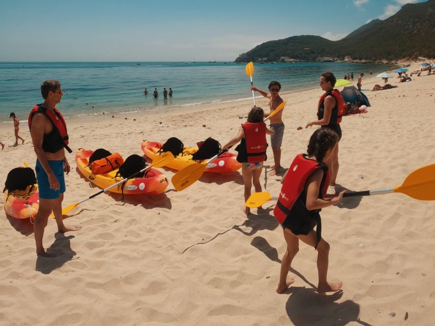 Lisbon: Arrábida Kayak & Wild Beach Snorkeling Pickup Option - Learning the kayak before heading along the cliffs