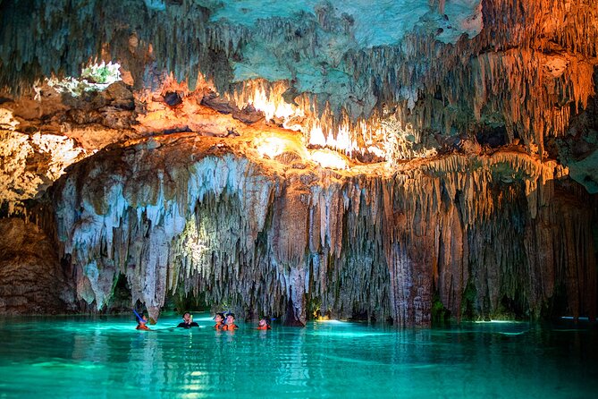 Magical Cenote and Paradise Lagoon Snorkeling Adventure - Entering the underground cenote
