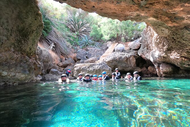 Mallorca: Kayaking, Sea Cave, Cliff Jumping & Snorkel Tour - The short coastal walk and optional cliff jump
