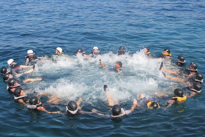 Mallorca: Kayaking, Sea Cave, Cliff Jumping & Snorkel Tour - Guides, safety, and the feel of the group