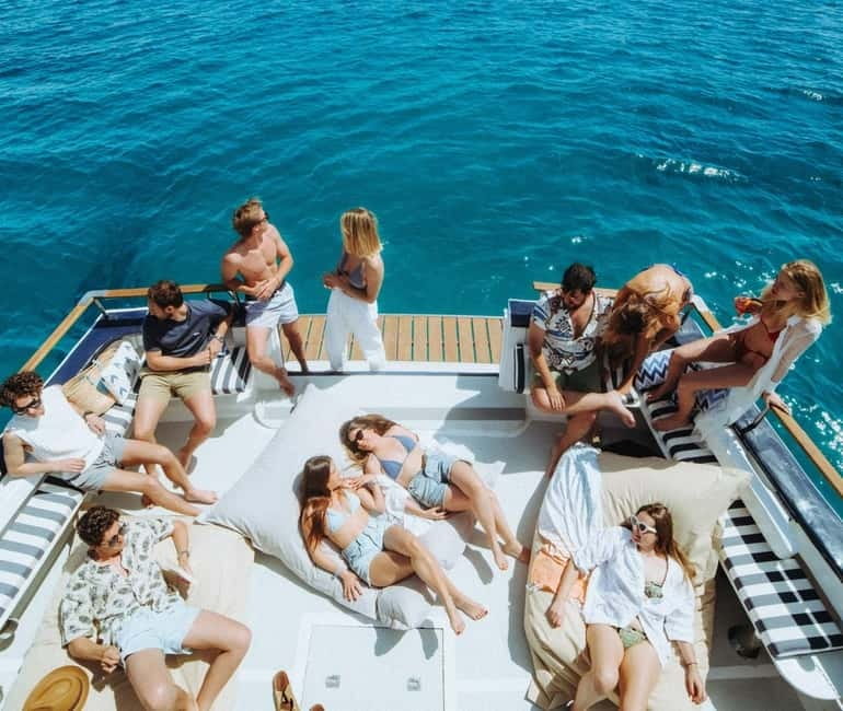 Mallorca: Palma Boat Tour & Snorkeling with Drink Included - Music, drinks, and the onboard mood