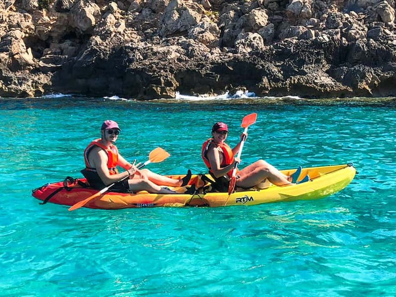 Mallorca: Sea Caves Kayaking Tour, Snorkeling & Snack - Inside the caves and along the rock shelves