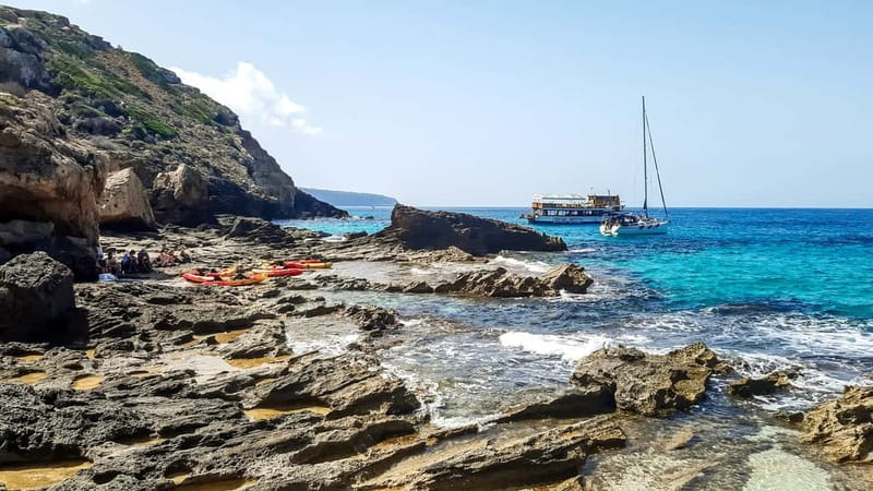 Mallorca: Sea Caves Kayaking Tour, Snorkeling & Snack - A sandwich break that improves the three-hour rhythm