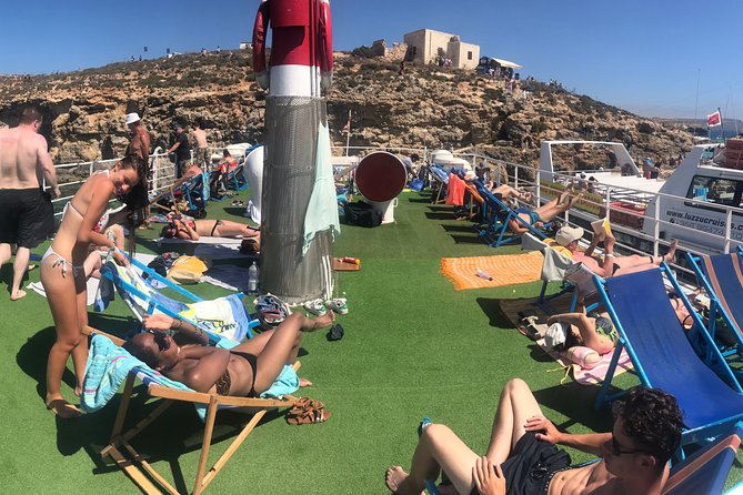 Malta: Comino, Blue Lagoon & Caves - swim, snorkel & slide - Seven hours from Bugibba to Comino