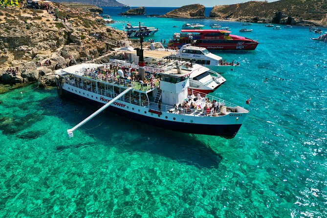 Malta: Comino, Blue Lagoon & Caves - swim, snorkel & slide - Cruising around tiny Comino