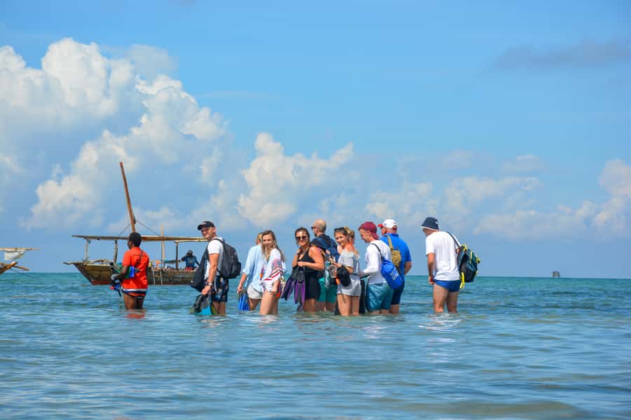 Matemwe: Mnemba Island Dolphin & Snorkeling Boat Trip - What to bring for a better morning