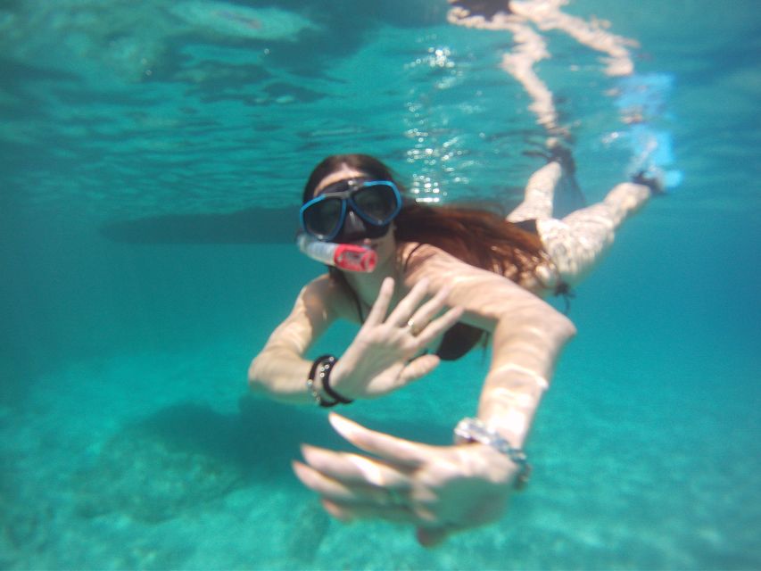 Menorca: Kayak and Marine Reserve Snorkeling Adventure - Paddling beneath La Mola de Fornells