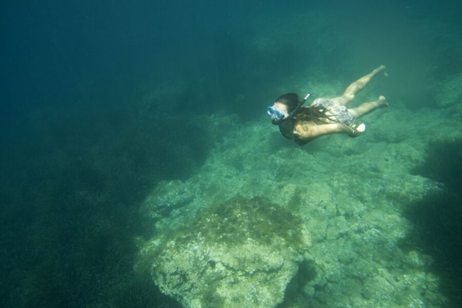 Menorca: Kayak and Marine Reserve Snorkeling Adventure - Resting at the quiet beach of s’Arenelet