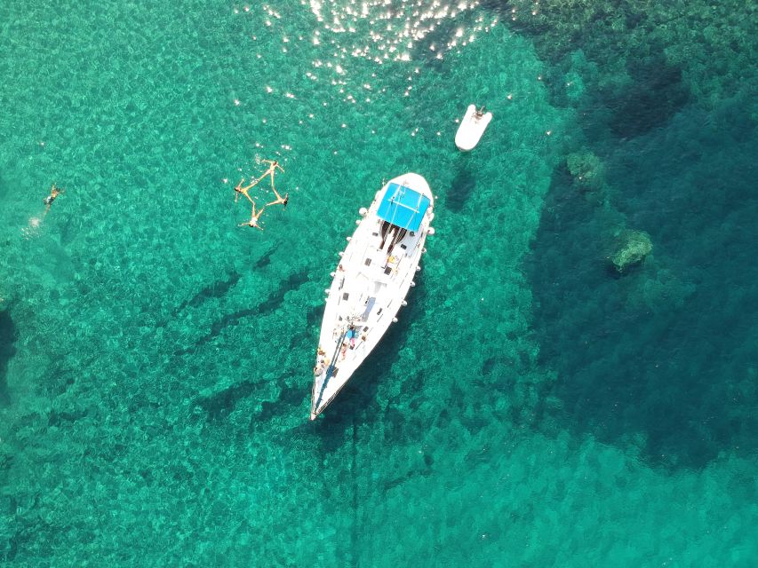 Milos: Milos and Polyaigos Snorkeling and SUP Cruise - Gerontas, Fyriplaka, Tsigrado, and Gerakas