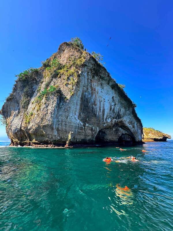 Mismaloya: Snorkeling, Cliff Jumping, and Beach Tour - Seeing the arches and caves from the boat