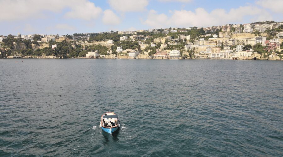 Naples: Castel dell'Ovo Boat Tour with Snorkeling & Aperitif - Palazzo Donn’Anna and the grand shoreline