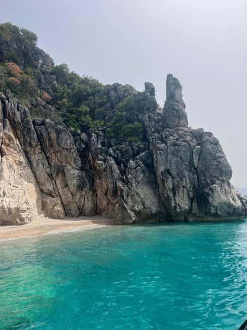 North Coast : Himare Boat Tour with Snorkeling Stops - Entering Pirates Cave at the end