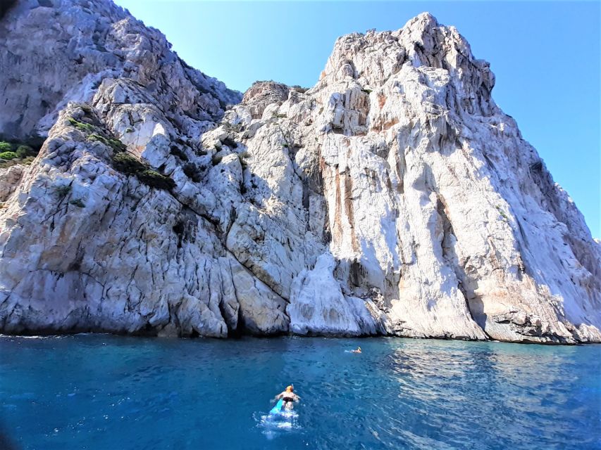 Olbia: Dolphin Watching Tour with Figarolo Island Snorkeling - What the boat provides for a half-day at sea