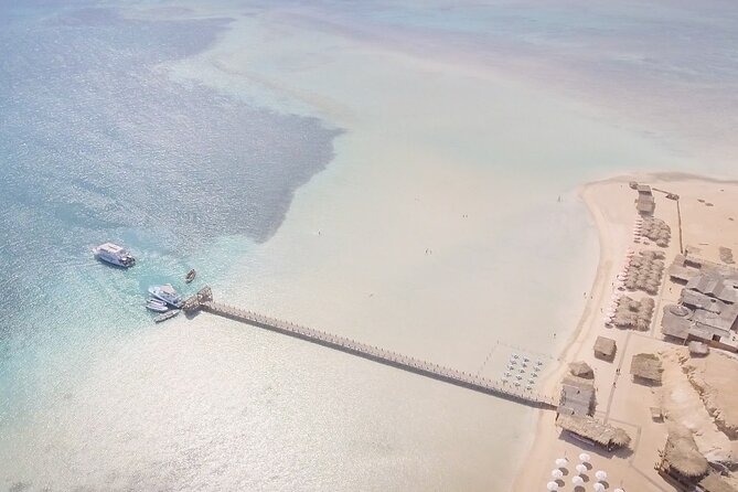 Orange Bay Island Snorkeling Trip With Water Sports - Hurghada - Crew service, safety, and the photography issue