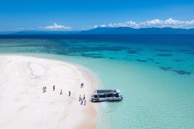 Outer Reef Mackay Cay Sail & Snorkel Adventure from Port Douglas - The glass-bottom boat and coral cay visit