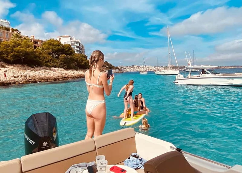 Palma de Mallorca: Private Boat Tour with Snorkel and Paddle - Family groups, nervous swimmers, and couples