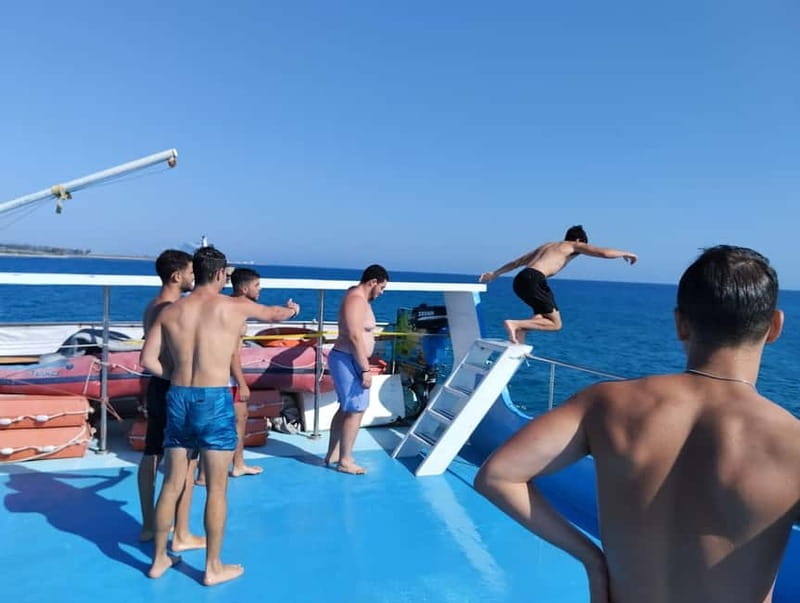 Paphos: Glass Bottom Boat Trip with Swimming or Snorkeling - Sea sponges and local coastal details