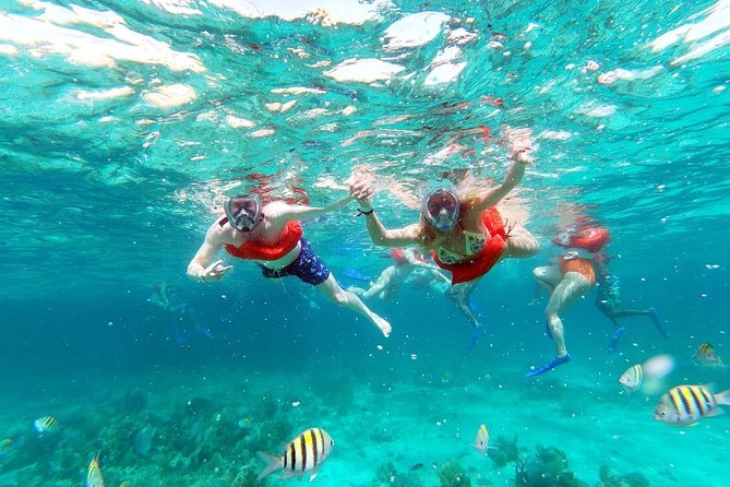 Party Catamaran: OpenBar, Music, Negril Beach, Caves, Snorkeling - Getting onto the catamaran