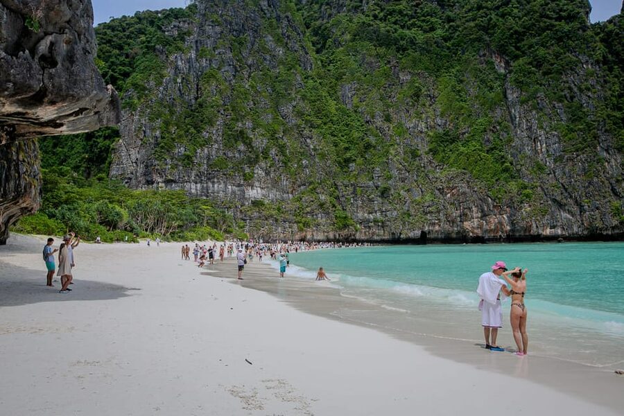 Phi Phi: 7 Island Longtail Boat Snorkeling Tour with Sunset - Pileh Lagoon is the first major swim