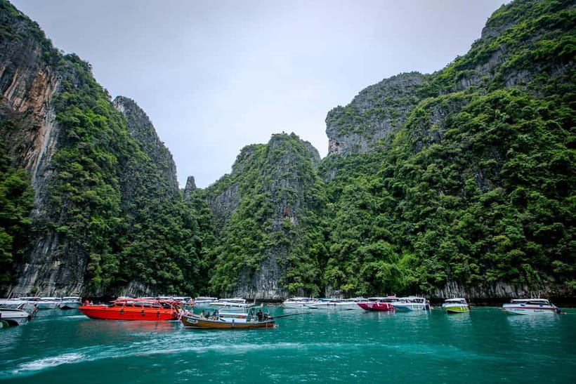 Phi Phi: 7 Island Longtail Boat Snorkeling Tour with Sunset - Loh Samah Bay adds another reef stop