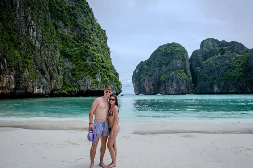 Phi Phi: 7 Island Longtail Boat Snorkeling Tour with Sunset - Monkey Beach starts the day with a little chaos