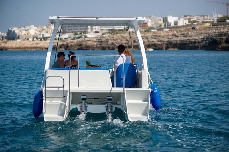 Polignano a Mare: Eco Boat Tour with Snorkeling and Caves - Snacks, soft drinks, and an easygoing atmosphere