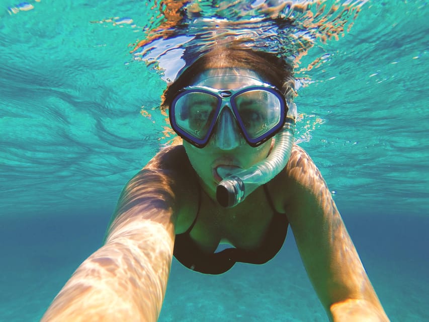 Port de Sóller: Snorkeling Tour with Professional Guide - The boat ride to the snorkeling cove