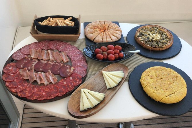 Private Catamaran Charter with Transfer, Buffet and Snorkeling - Lunch, tapas, and drinks between swims