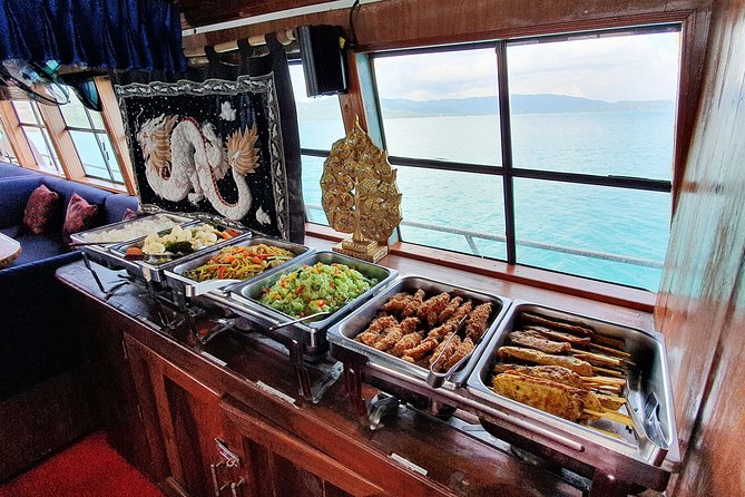 Private Full-Day Red Dragon Yacht for Snorkeling Koh Tan & Visit Pink Dolphin - Khanom brings the chance to see pink dolphins