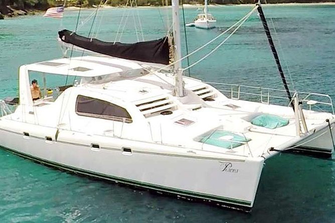 Private Luxury Catamaran Yacht. Full or Half Day Charter - Sail, Beach, Snorkel. - Planning the route with your captain