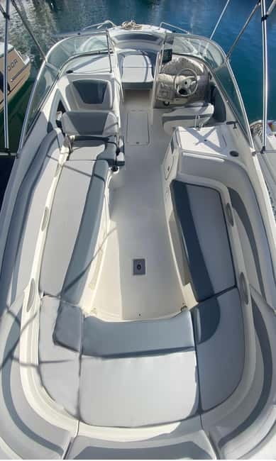 Puerto Banús: Floky Boat Cruise with Snorkeling & Paddle SUP - Leaving Puerto Banús by private boat
