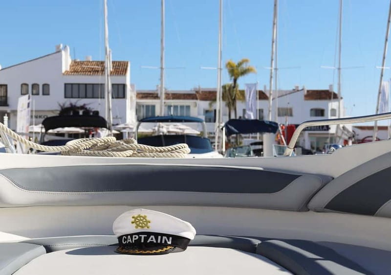 Puerto Banús: Floky Boat Cruise with Snorkeling & Paddle SUP - Swimming from the aft platform