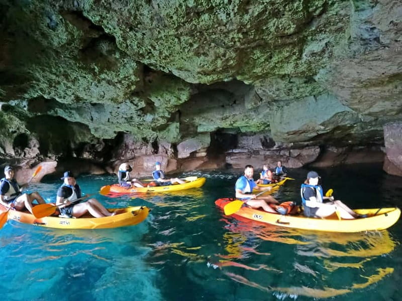 Puerto Mogán: Guided Adventure Kayak Tour in Caves & Snorkel - Optional cliff jumps and rock time