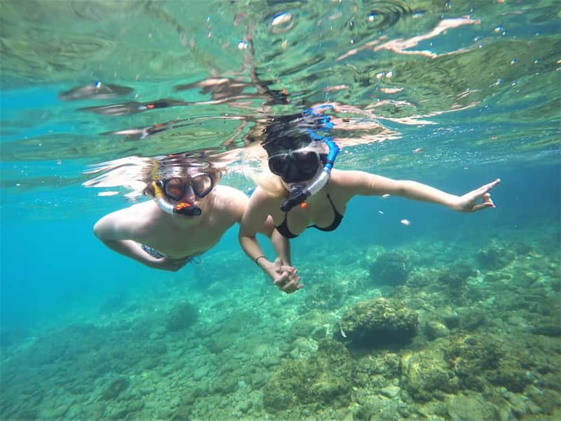 Pula: Cave Kayak Tour, Snorkeling and Island Jumping - Paddling the coast toward the pigeon cave