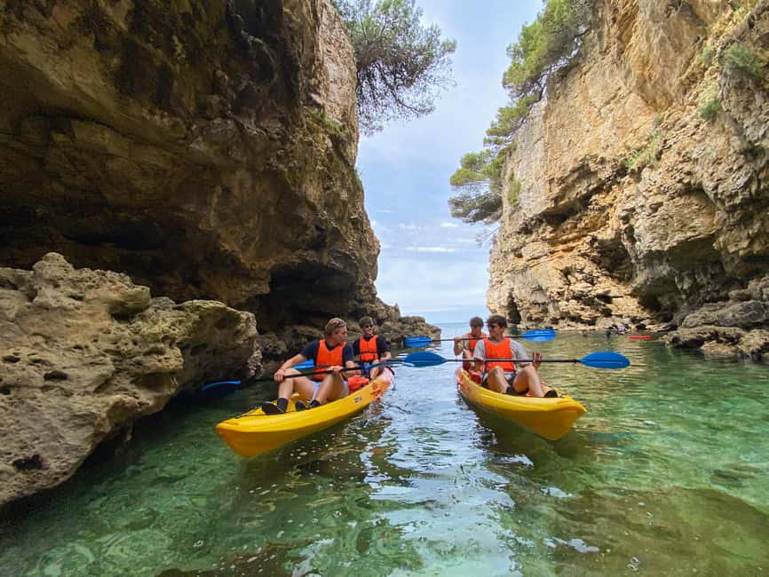 Pula: Cave Kayak Tour, Snorkeling and Island Jumping - Snorkeling in clear Adriatic water