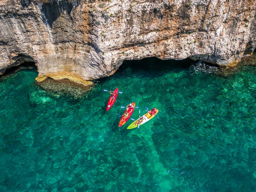 Pula: Kayak Adventure with Cave & Island Snorkeling - Paddling out from Beach Bar Kanalić