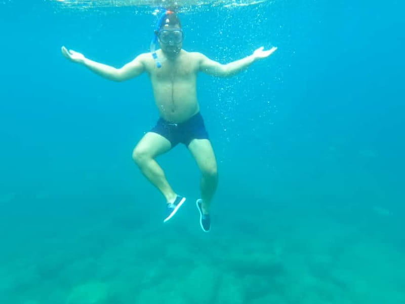 Pula: Kayak Tour, Cliff Jumping, Snorkeling & GoPro Pictures - Cliff jumping with a guide