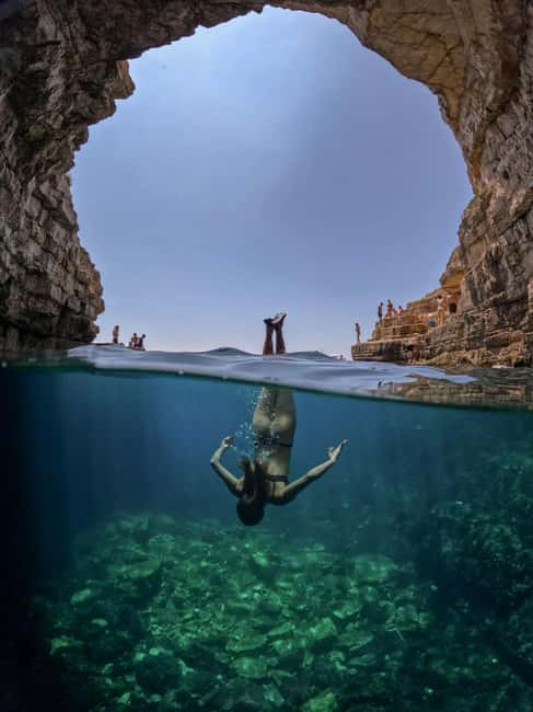 Pula: Kayaking,Snorkeling, Cliff jumping Tour with Wetsuit - Beer, water, and the pace of the afternoon